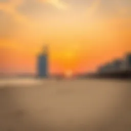 A serene sunset view over a Dubai beach with golden sands.